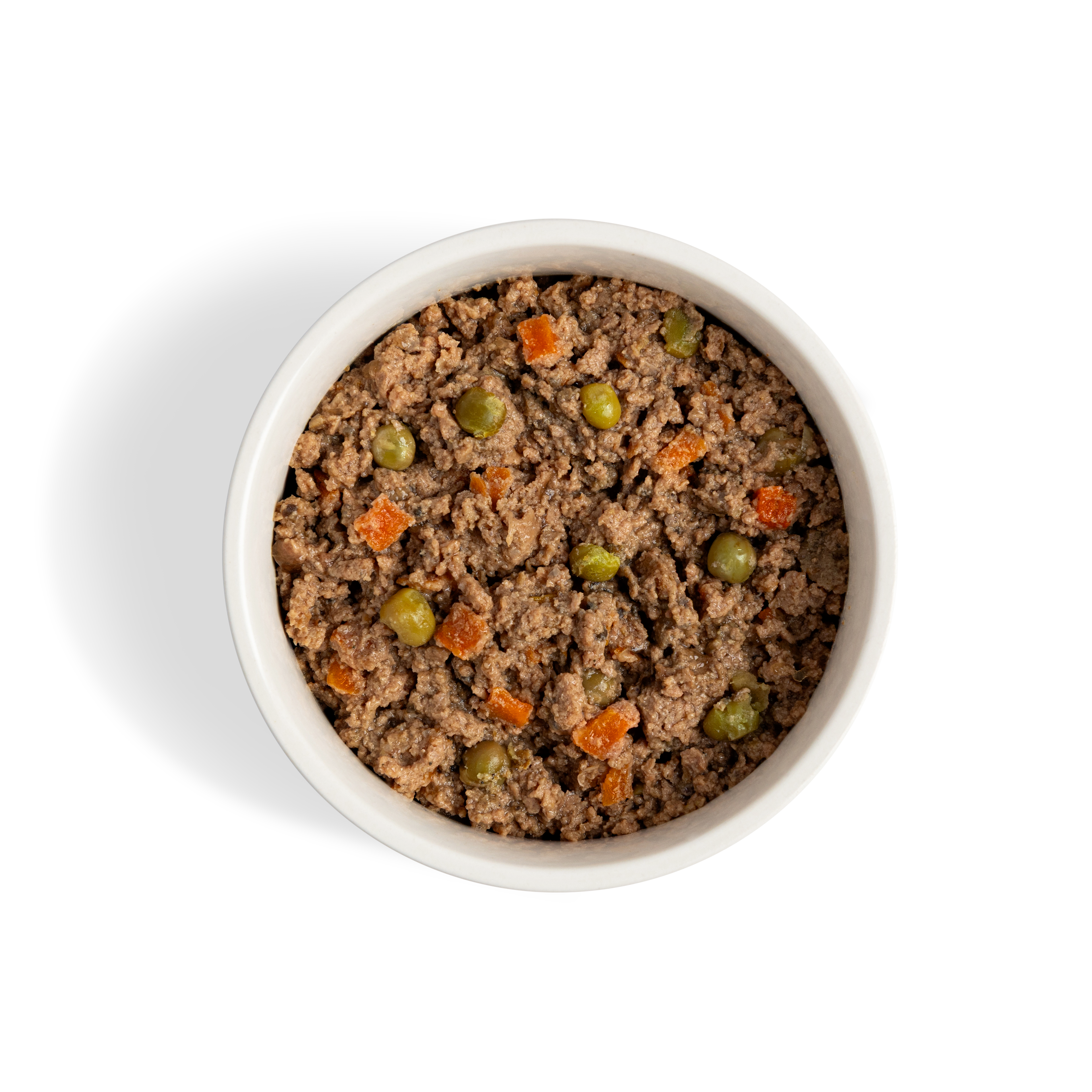 Bowl of WITHIN complete wet dog food made with visible vegetables including peas and carrots.